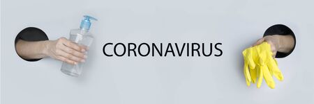 Coronavirus prevention protective yellow gloves and hand sanitizer gel for hand hygiene virus...