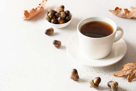 Acorn coffee substitute on white table. Close up. Space for text.の写真素材