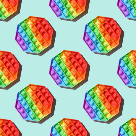 Seamless pattern of silicone colorful antistress pop it toy.の写真素材