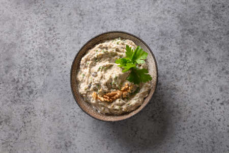 Baba ganoush Levantine cuisine appetizer from baked eggplant with parsley, garlic and olive oil.の写真素材