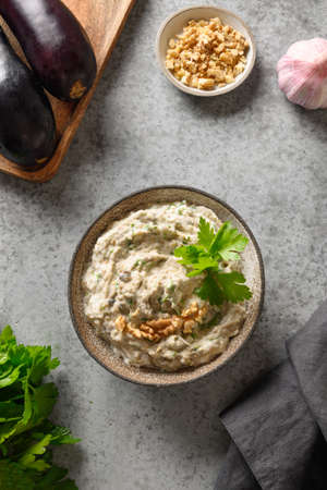 Baba ganoush of baked eggplant with parsley, garlic and olive oil.の写真素材