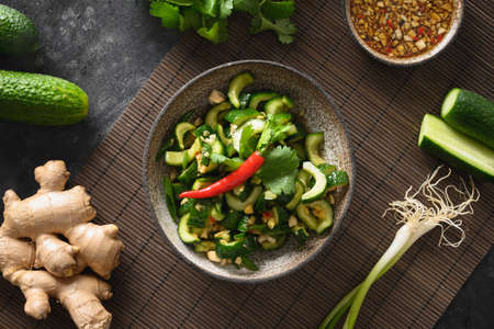 Chinese asian spicy broken cucumbers salad. Spicy cucumbers.の写真素材