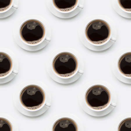 Seamless pattern of black coffee in white cup on white.の写真素材