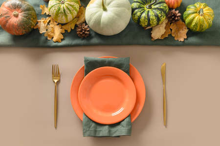 Autumn table setting decorated fall harvest for Thanksgiving day.の写真素材