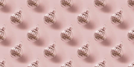 Seamless pattern of Christmas silver balls on pink. Xmas abstract background.の写真素材