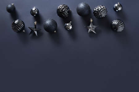 Christmas blue baubles on blue monochrome background. Xmas greeting card.の写真素材