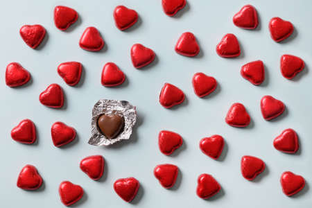 Pattern of red sweets romantic as heart on blue. Valentines day,の写真素材