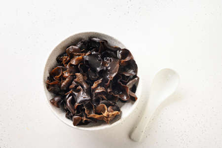 Salad of chinese pickled tree black muer mushrooms in bowl.の写真素材