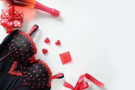 Sexy red lace black bra for romantic dating or Valentines day, gift, bustier underwear, champagne.の写真素材