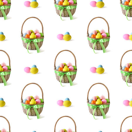 Easter wicker basket with pastel colorful eggs isolated on white.