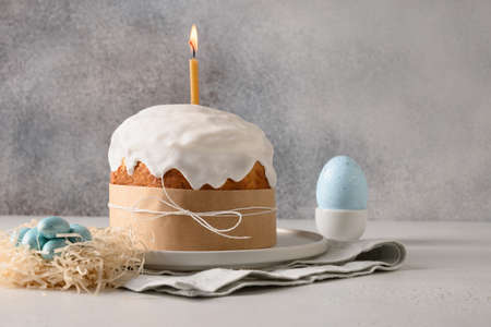 Homemade Easter cake, pink eggs, easter rabbit for celebration religion custom.