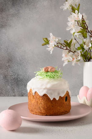 Easter orthodox cake decorated eggs and spring blossom flowers. Christian custom.