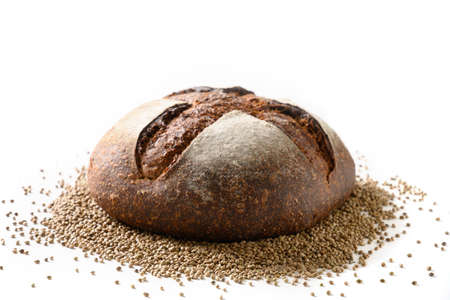 Loaf of Hemp bread and hempseeds isolated on white background. Close up.
