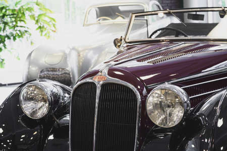 04.06.2022 Moscow - Vintage retro car branded Delahaye, chrome headlights, cabriolet. Close up.