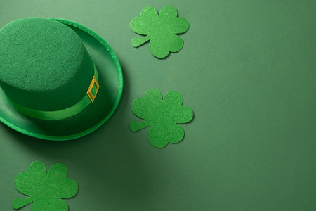 St Patricks day and March 17 concept with green parade Leprechaun Hat with belt and buckle, clover...