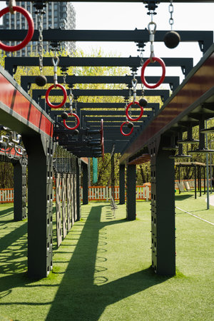 Gymnastic rings to strengthen the arms on playground for kids and adult. Outdoor sports activities....