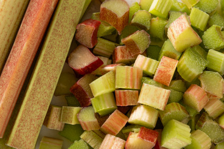 Freshly peeled chopped rhubarb stalks ready for cooking. Frozen food. Save for cooking later. Food...