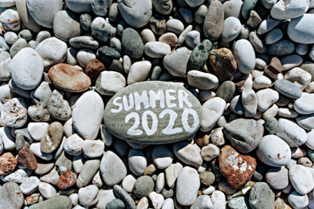Stones on the stone beach and the inscription summerの写真素材