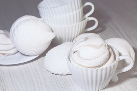 Confectionery, food, dessert. White sweet marshmallows on a light background.の写真素材