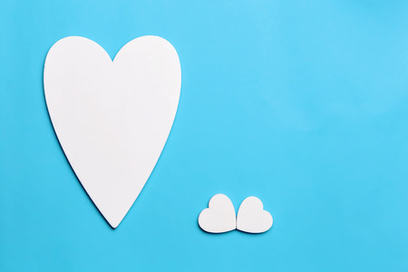 Postcard to the Valentine's Day, Mother's Day, March 8, with a newborn. The symbol of love is a...