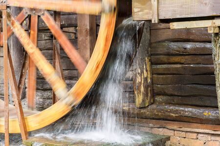 Historical ancient landmarks of the Saratov region, Russia. Old restored wooden water mill of the 19th century 1851 in the village of Lohの写真素材