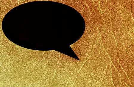 Golden yellow decorative background with empty space frame for writing text thoughts comment message icon black.の写真素材