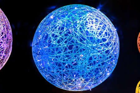 Abstract neon futuristic magic glowing art LED background with wicker shapes multicolored blue, red...