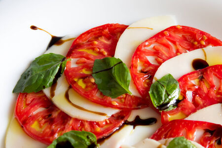 Caprese salad on plateの写真素材