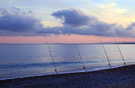 Fishing rods on the coastの写真素材