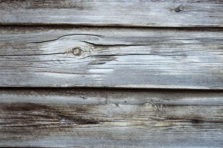 Fence made of old unpainted wooden planks natural color