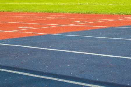 Starting of stadium track for a sprint. Fitness, healthy lifestyle concept