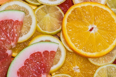 Juicy bright citrus fruit for natural background. Theme of healthy eating, diet, vitaminsの写真素材