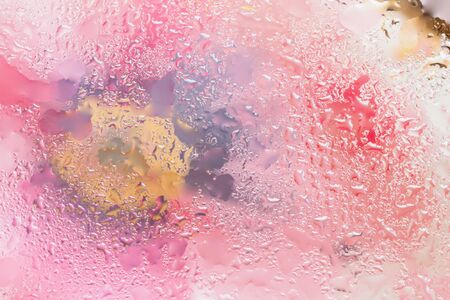 Fashionable abstract background in pink with raindrops, blurred style. Delicate tints for modern...