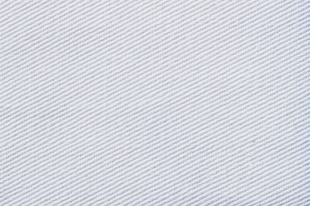 Fabric texture, diagonal pattern, light color. For background , backdrop, substrate, composition use. With place for your textの写真素材