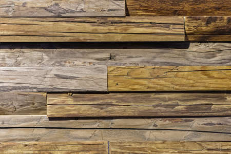 Wooden texture with scratches and cracks. Creative natural backdrop as basis for vintage design.