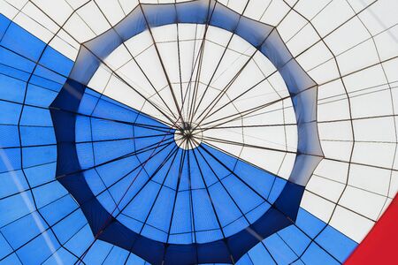Abstract surface texture of hot air balloon close-up. Bright colors. Background for bright moments of lifeの写真素材