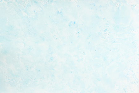 Watercolor stains, strokes of blue shades. Abstract watercolor background. Delicate shades of tender winter, snow, spring colors. Hand-drawn background, paper textureの写真素材