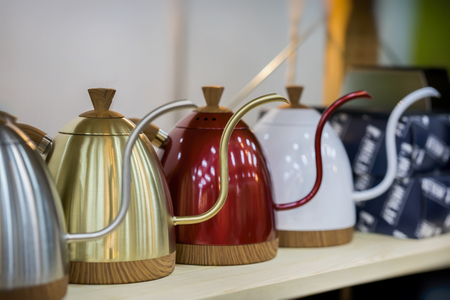 Modern metallic colorful teapots for filtered coffee, cafe shopの写真素材