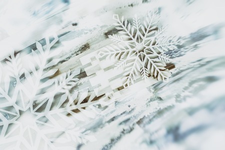 Abstract blurred festive Christmas background with decoration snowflake in light blue colorsの写真素材