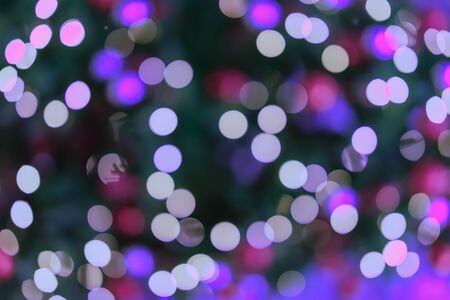 Abstract colorful violet purple bokeh design, defocused lights, holiday background. Festive occasions concept, Christmas, New Year backdropの写真素材