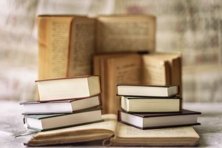 Pile of the old and new books, vintage, selective focus, abstract backgroundの写真素材