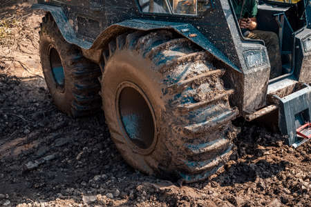 Extreme rally, dirty off-road ATV car closeup. Adventure concept