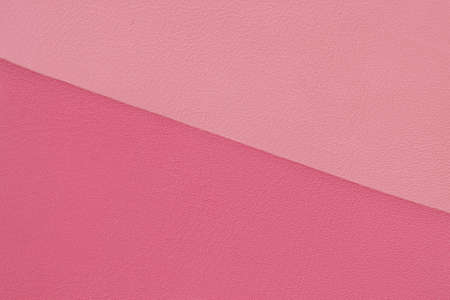 Texture of genuine leather, two variety shades of pink colors. Fashionable modern background, copy...