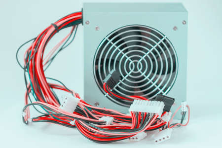 Computer power supply with cables and plugs close-up