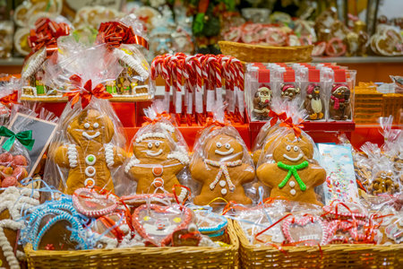 Christmas market stall with gingerbread cookies and candy canes. Concept of festive baking, sweet...