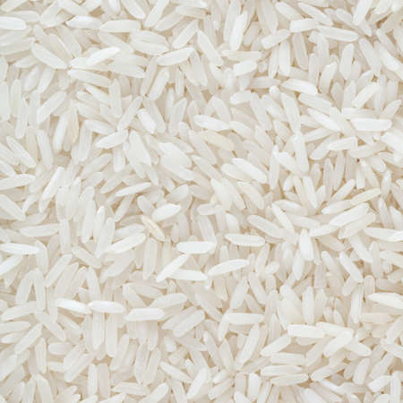 Uncooked white long-grain rice backgroundの写真素材