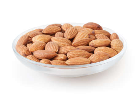Almonds isolated on white backgroundの写真素材