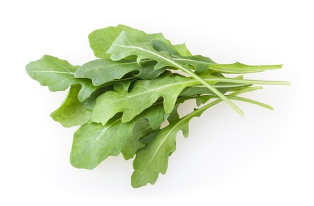 Heap of fresh arugula leaves isolated on white backgroundの写真素材