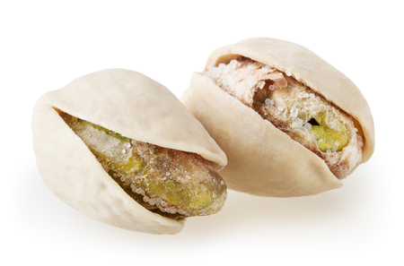 Salted pistachios isolated on white backgroundの写真素材