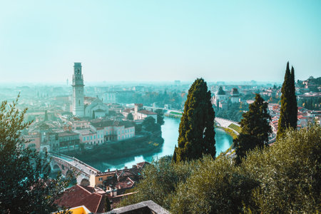 Blue hours in Verona centre, Italy. Panoramic view from above on Adige river and Ponte Pietra bridgeの写真素材